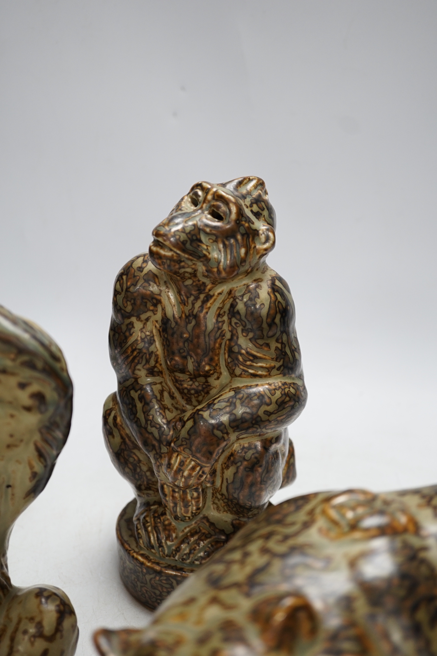 Three Royal Copenhagen, stoneware animals by Knud Kyhn; a monkey (21633), an ape (20227) and a bear (20140), tallest 21.5 cm